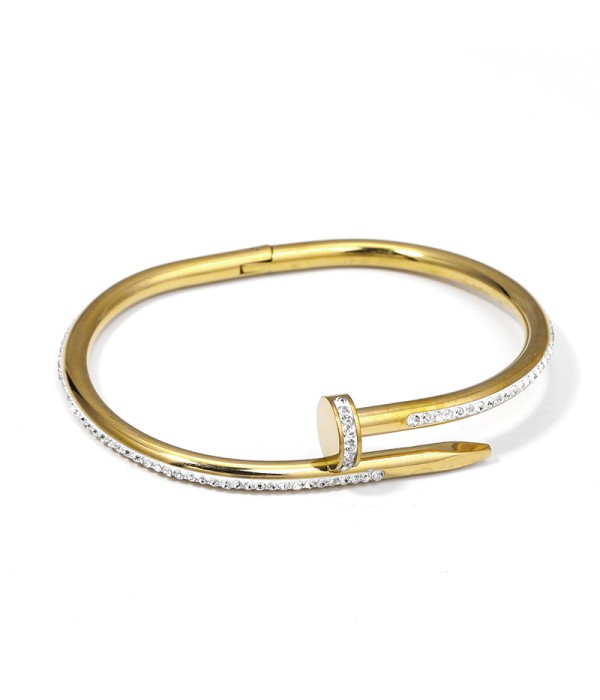 Pulsera rígida de clavo dorada con circonitas