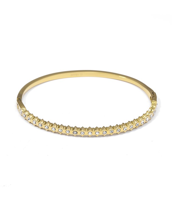 Pulsera dorada con textura y circonitas en relieve