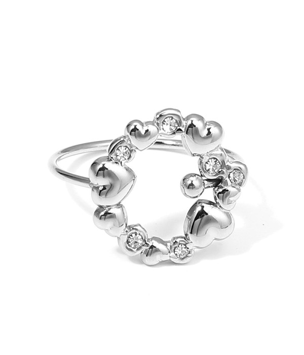 Anillo plateado con corazones y circonitas en forma de...