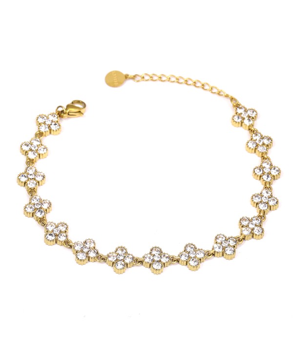 Pulsera dorada con flores de circonitas