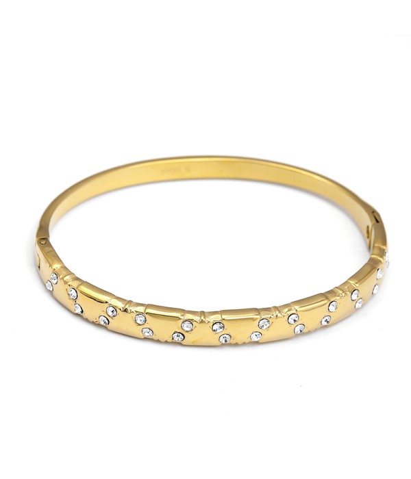 Pulsera rígida dorada con circonitas