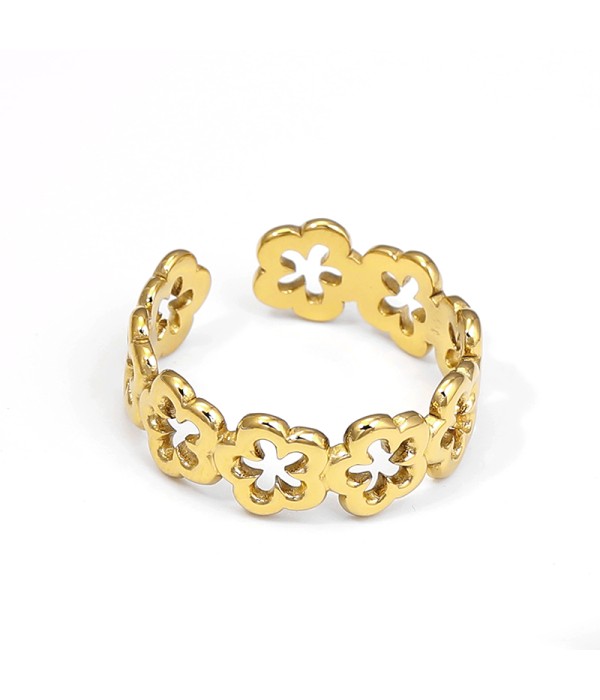 Anillo dorado con flores caladas en patrón continuo