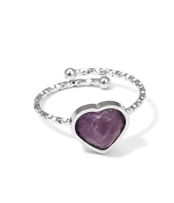 Anillo plateado ajustable con corazón de piedra