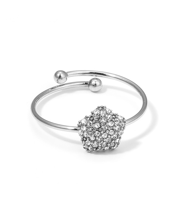 Anillo abierto con estrella de circonitas
