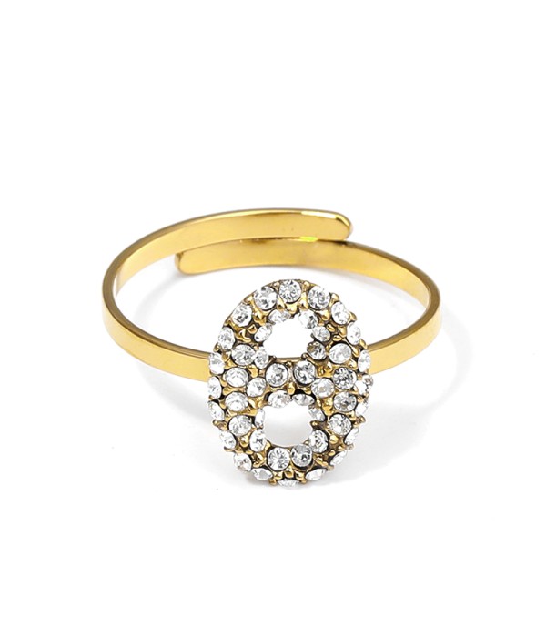 Anillo dorado con motivo ovalado de circonitas