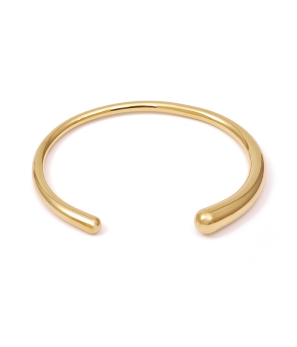 Pulsera dorada abierta con diseño minimalista