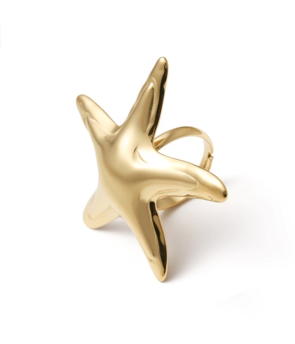 Anillo dorado con gran estrella de mar