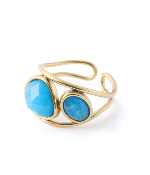 Anillo dorado con piedras tipo jade