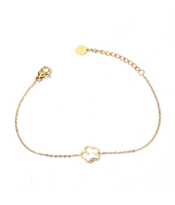 Pulsera dorada con flor y detalles en circonitas
