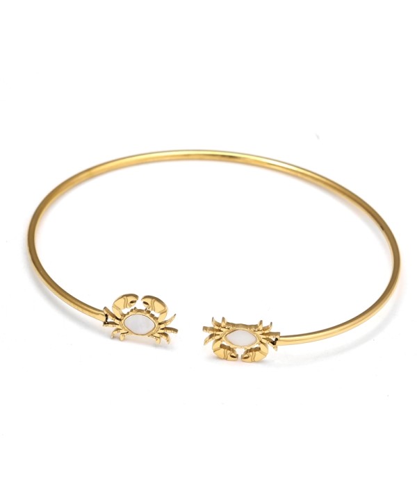 Pulsera rígida dorada con cangrejo de nácar
