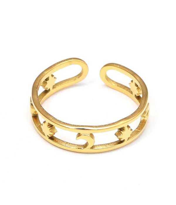 Anillo dorado con diseño de estrella y luna