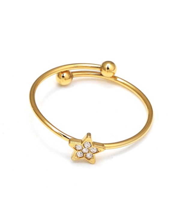 Anillo dorado con estrella y circonitas