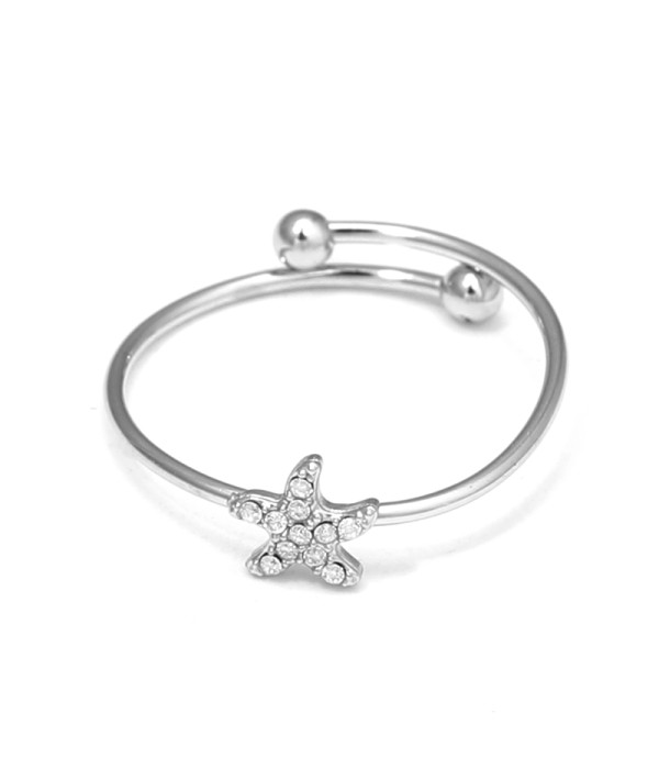 Anillo plateado con estrella de mar  y circonitas