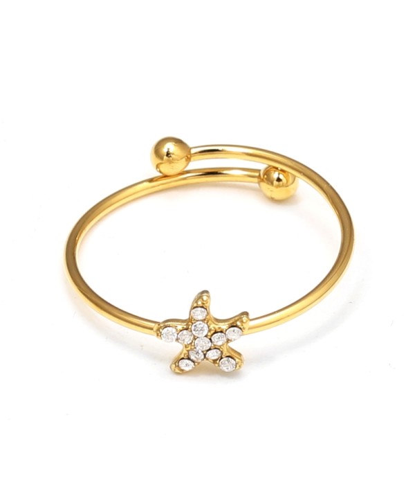 Anillo dorado con estrella de mar  y circonitas