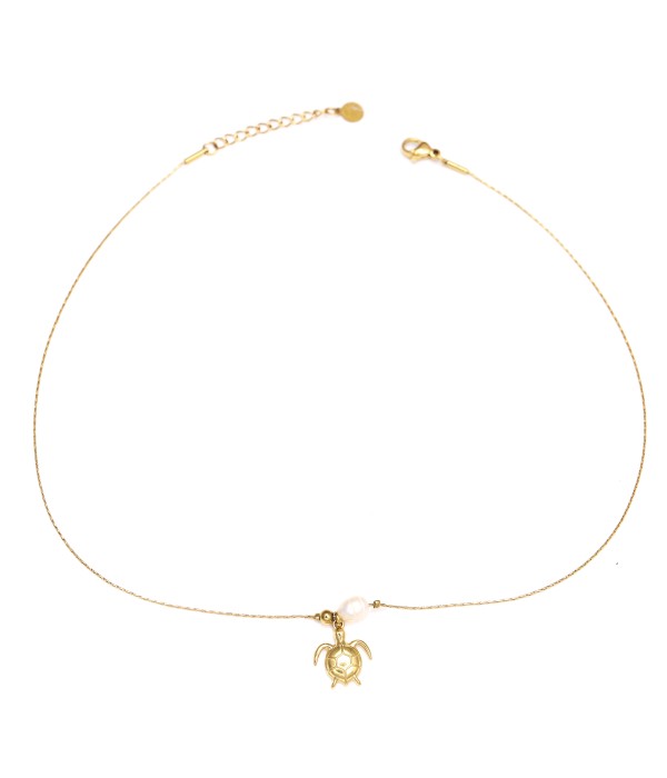 Collar dorado con tortuga y perla