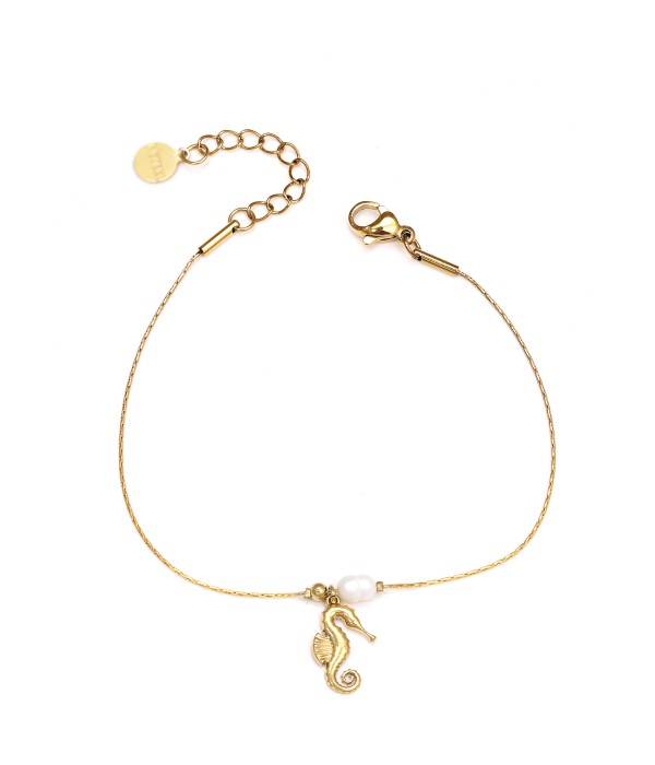 Pulsera dorada con caballito de mar y perla