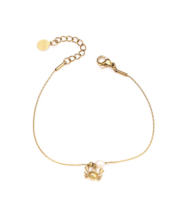 Pulsera dorada con cangrejo y perla