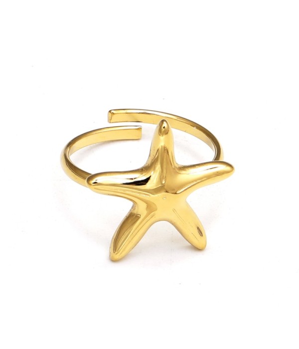 Anillo dorado con estrella de mar