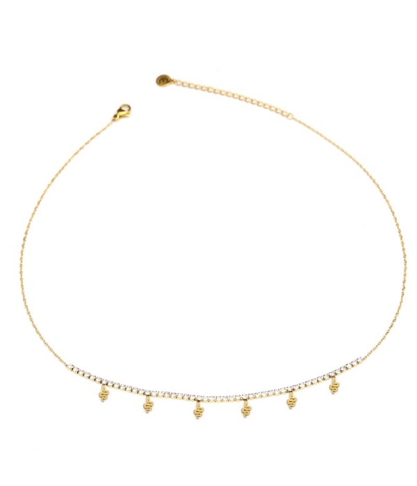 Collar dorado con detalles brillantes y...