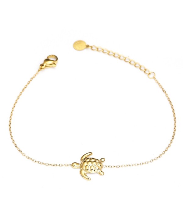 Pulsera fina dorada con colgante de tortuga