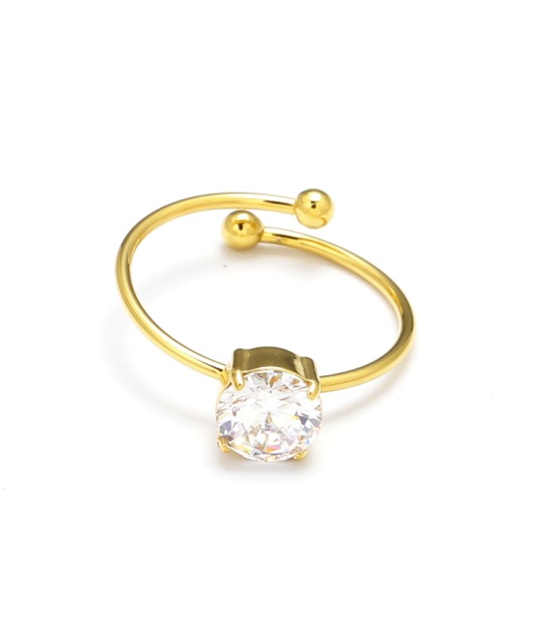 Anillo dorado con piedra cental corte círculo