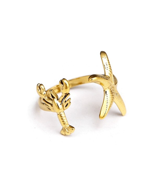 Anillo dorado de estrella de mar y langosta