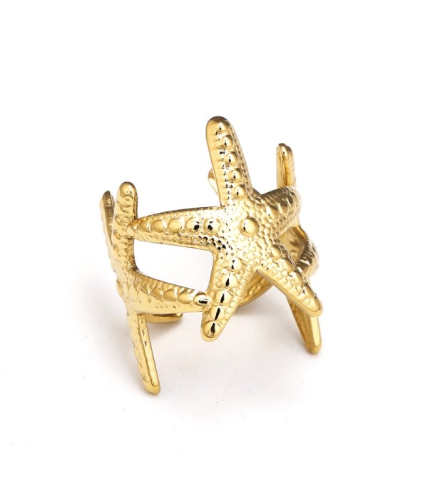 Anillo dorado con estrella de mar