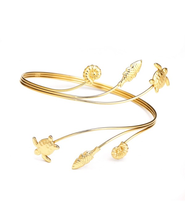 Brazalete de brazo dorado con tortugas, caracolas y pez