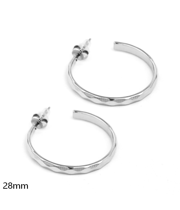 Pendientes de aro plateados con textura...