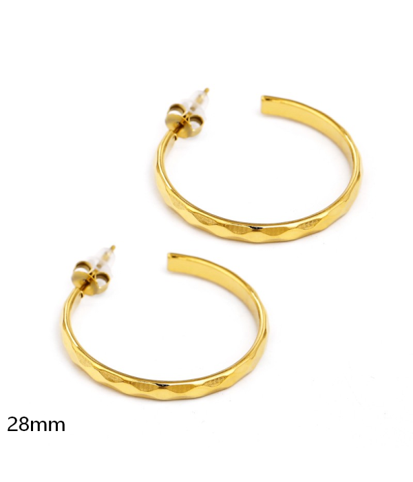 Pendientes de aro dorados con textura...