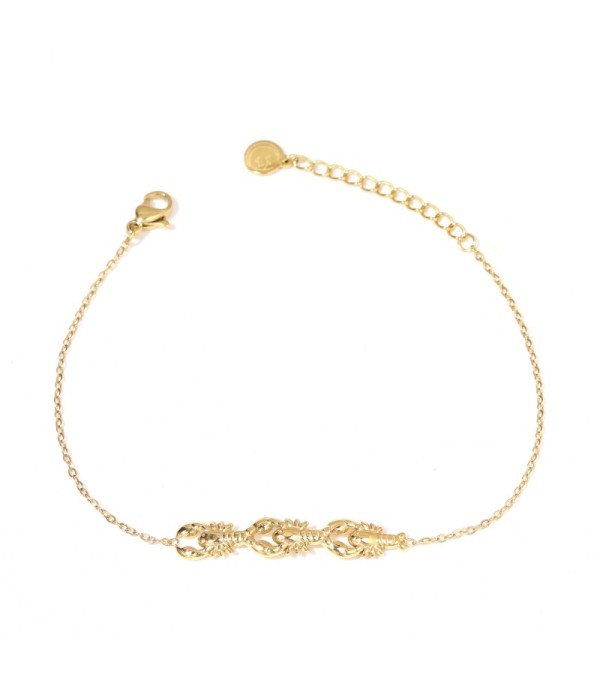 Pulsera dorada con cangrejo