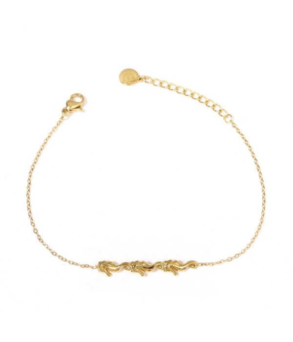 Pulsera dorada con caballito de mar