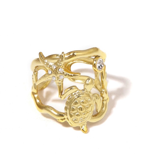 Anillo dorado con estrella de mar, tortuga y circonitas