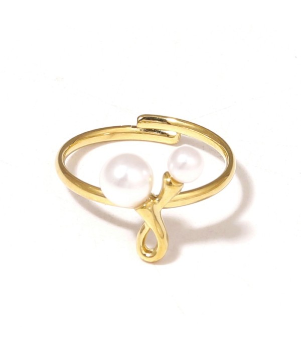 Anillo con línea curva y perlas