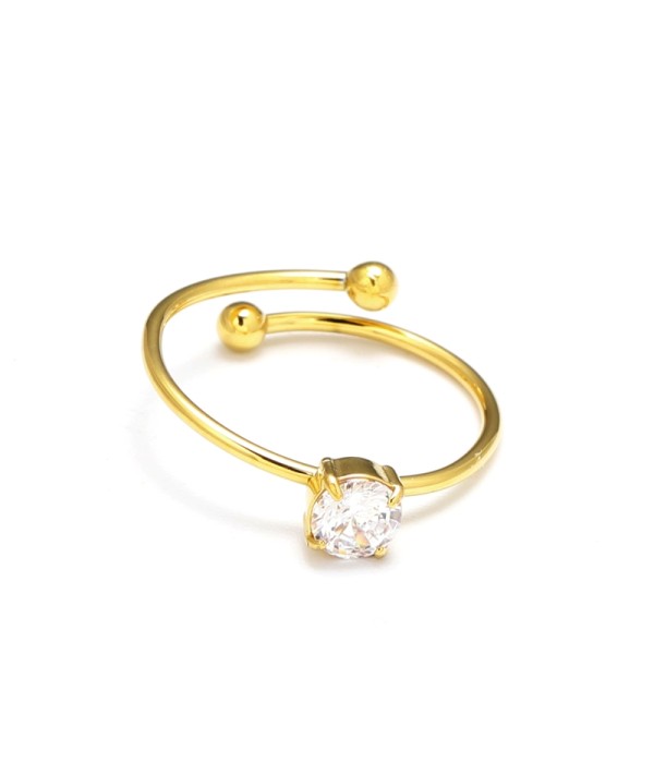 Anillo dorado con piedra cental corte mini círculo