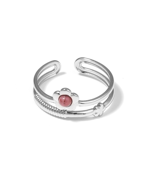Anillo plateado con flor y piedra