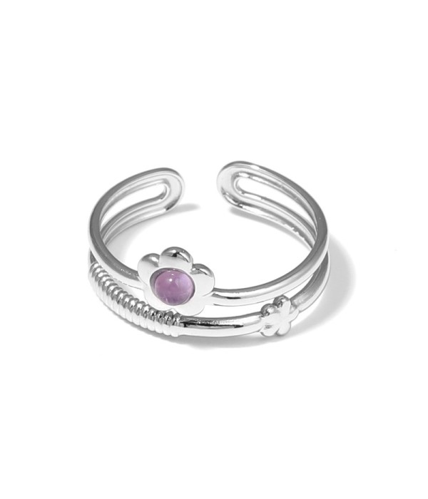 Anillo plateado con flor y piedra