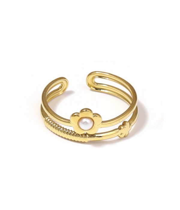 Anillo dorado con flor y piedra