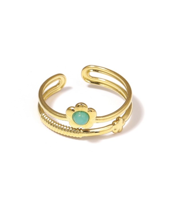 Anillo dorado con flor y piedra