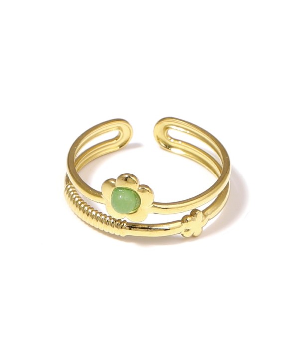 Anillo dorado con flor y piedra