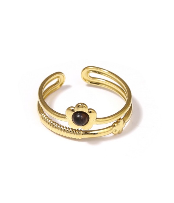 Anillo dorado con flor y piedra