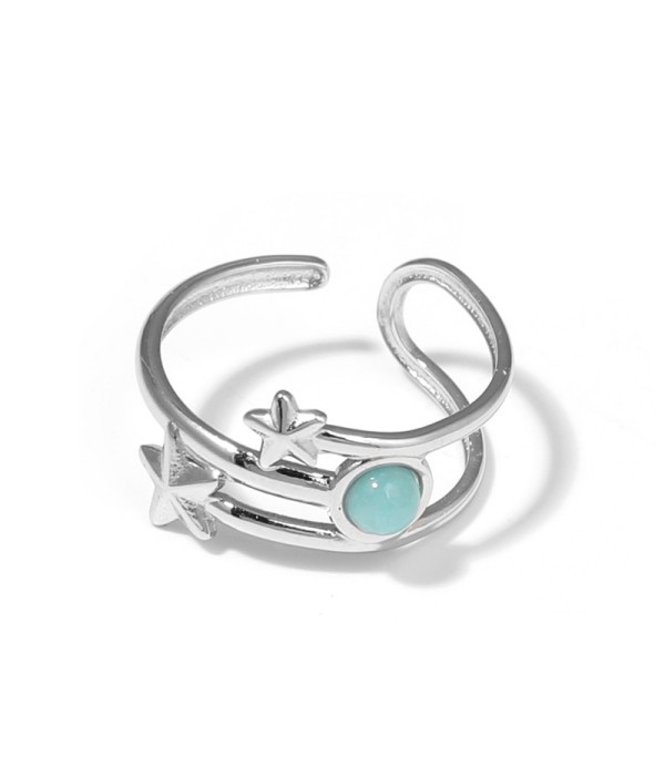 Anillo plateado con estrellas y piedra