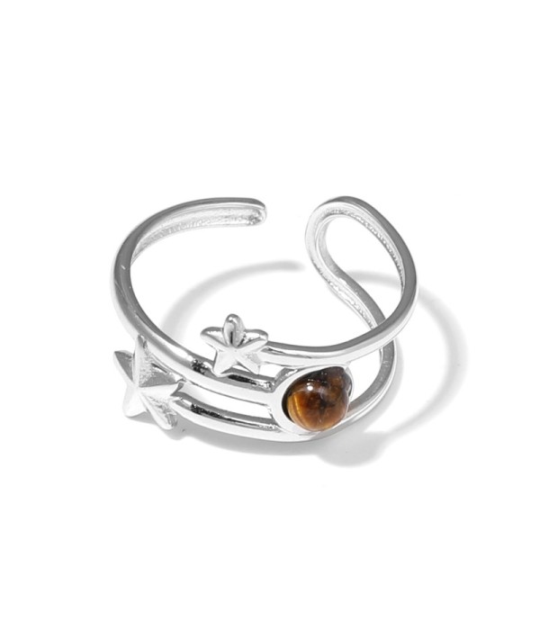 Anillo plateado con estrellas y piedra