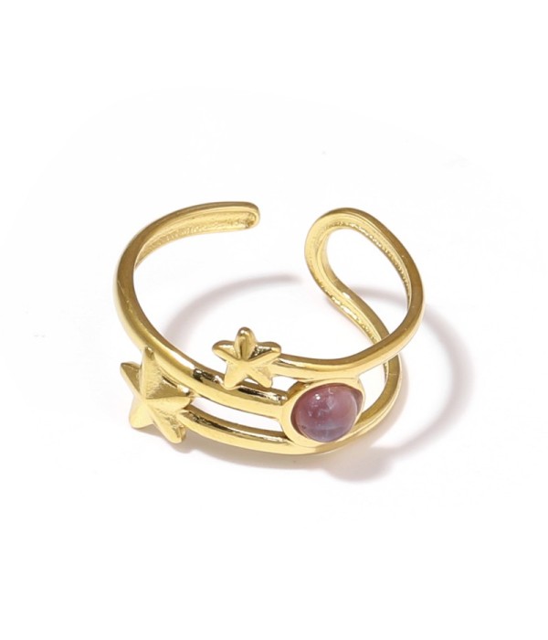 Anillo dorado con estrellas y piedra
