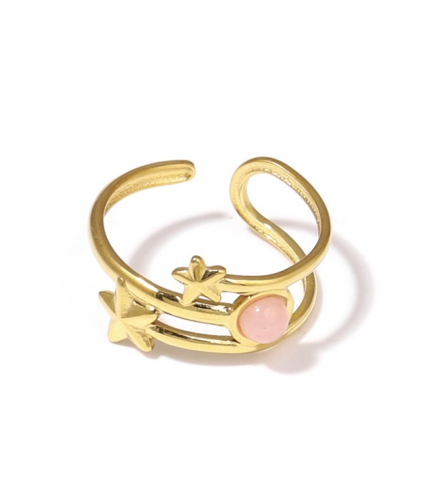 Anillo dorado con estrellas y piedra