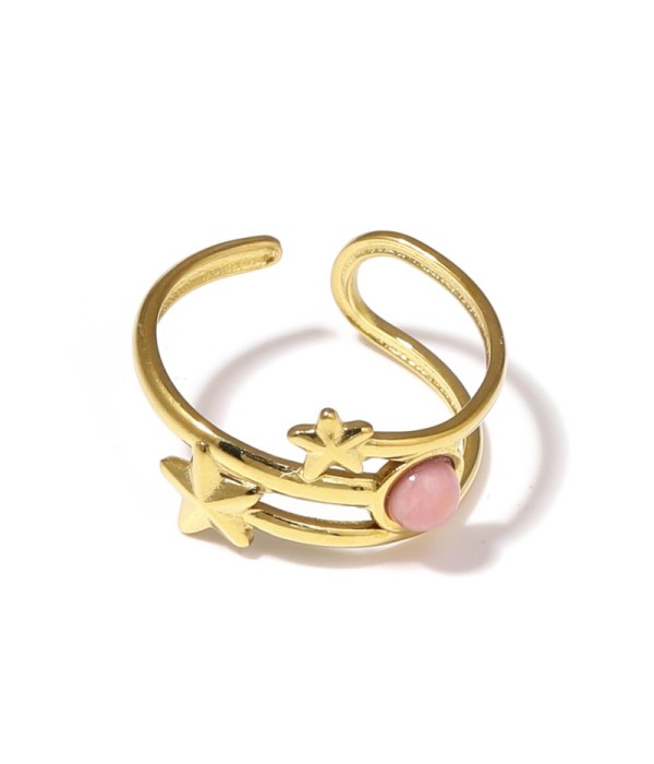 Anillo dorado con estrellas y piedra