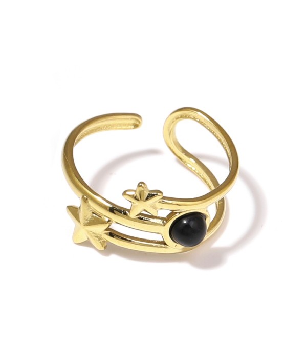 Anillo dorado con estrellas y piedra