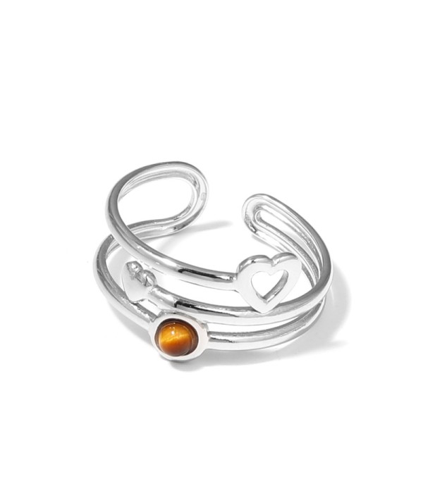 Anillo plateado con corazones y piedra