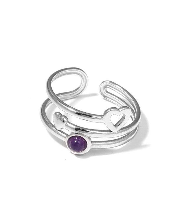 Anillo plateado con corazones y piedra
