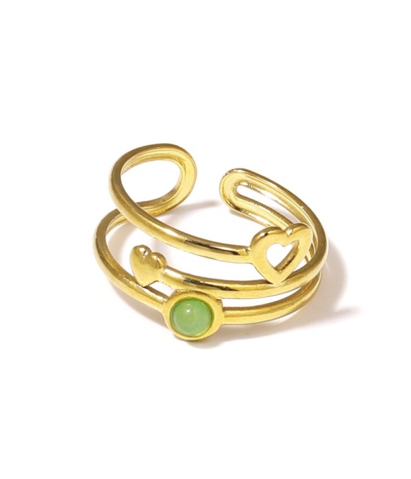 Anillo dorado con corazones y piedra